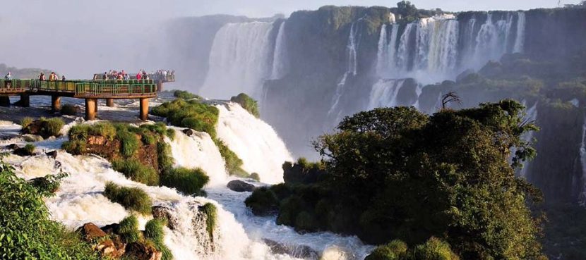 Brazilian side of Iguazu Falls with lookout bridge overhang